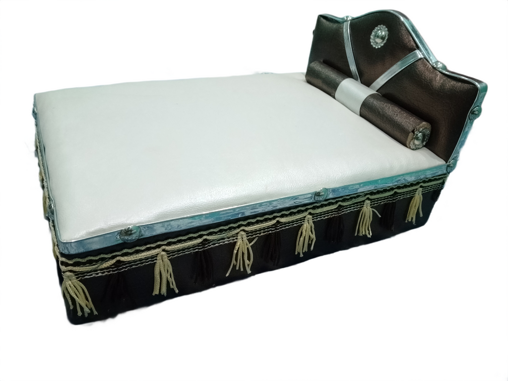Decorative bed with white mattress and black frame on a white background