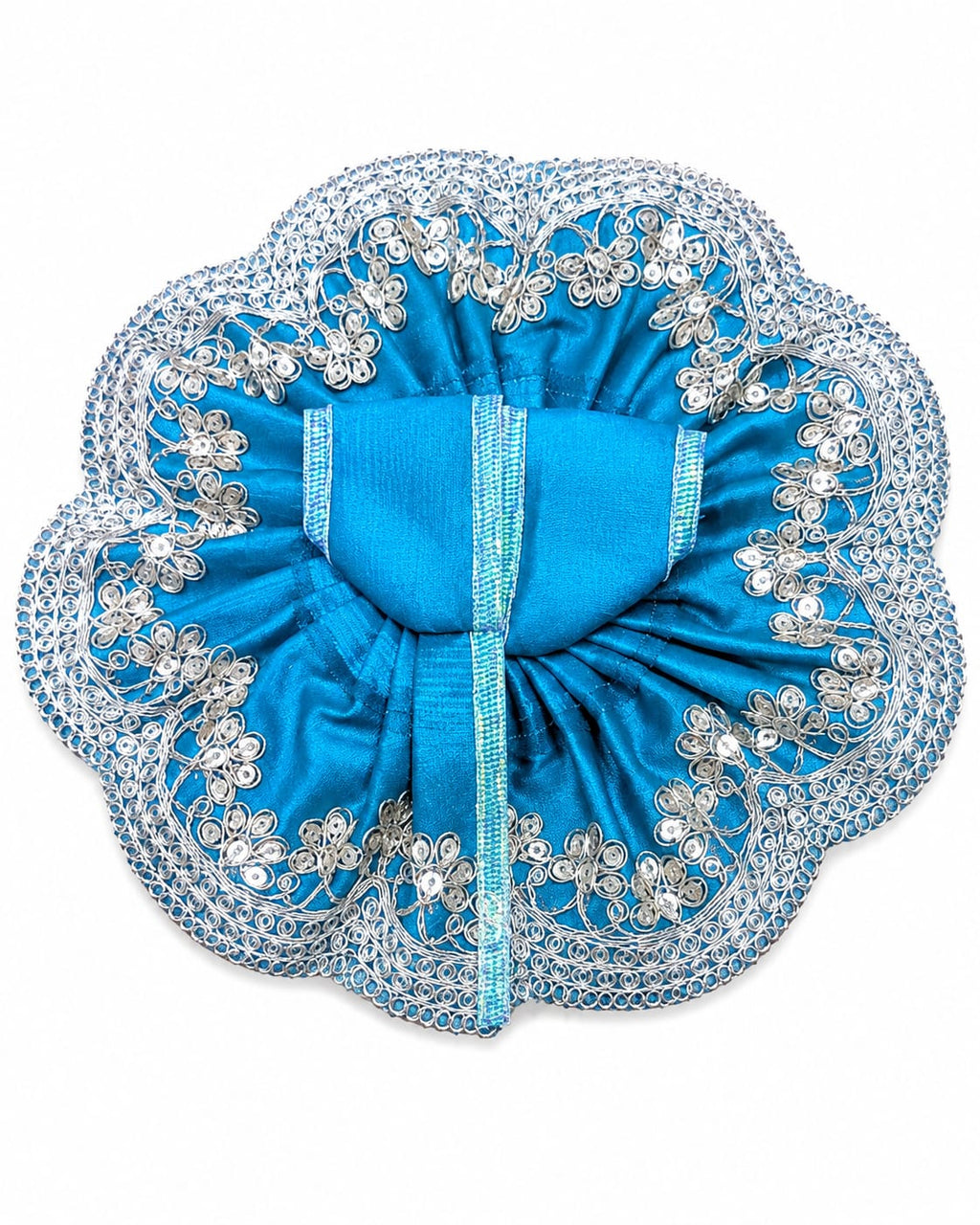Blue decorative item with intricate silver embellishments on a white background