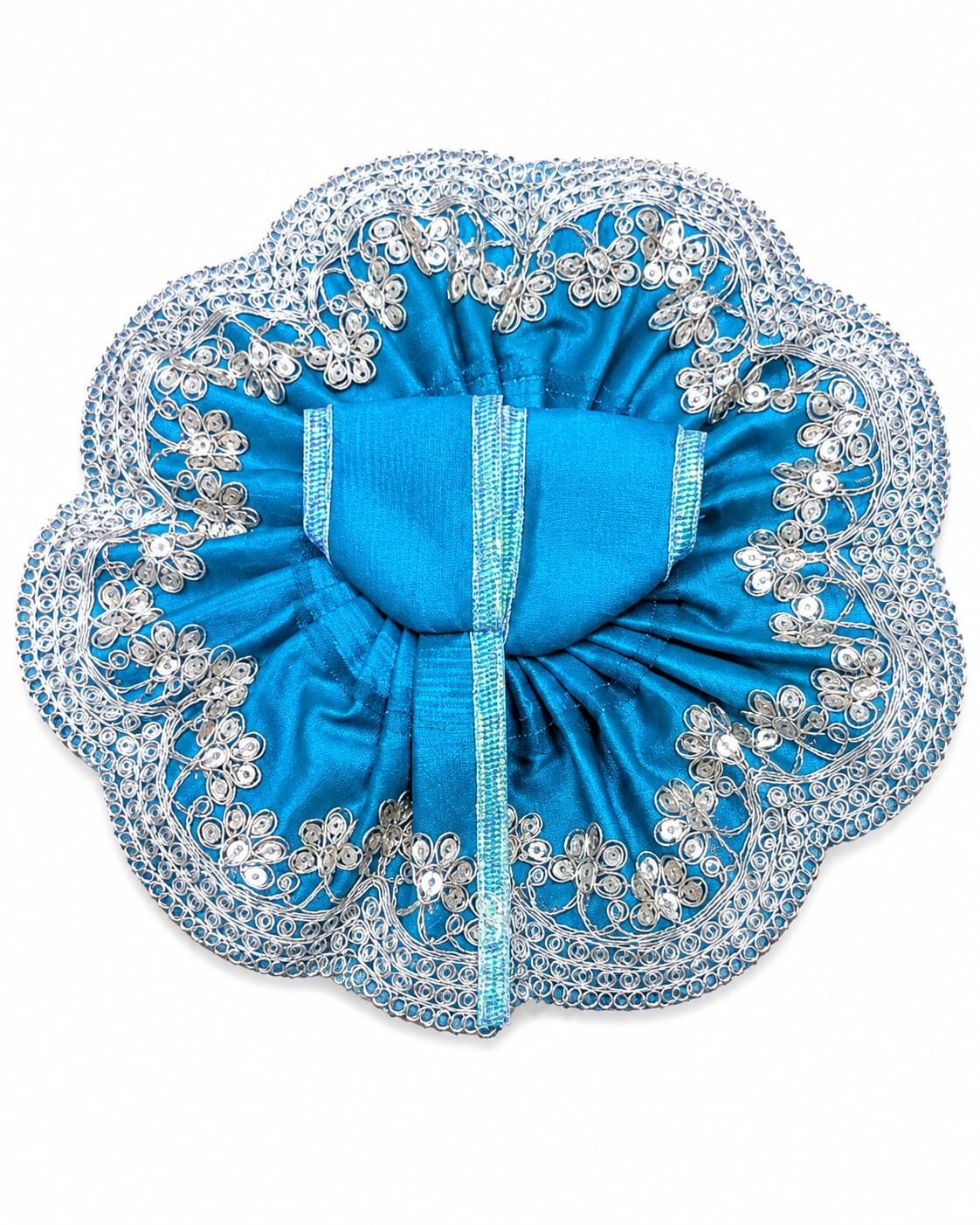 Blue decorative item with intricate silver embellishments on a white background
