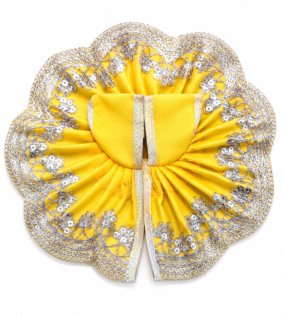 Yellow decorative item with intricate silver patterns on a white background
